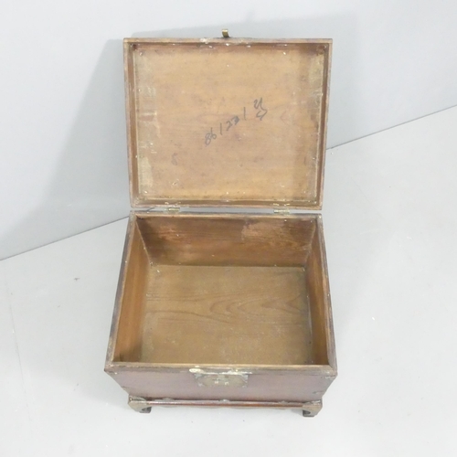 2034 - A Chinese elm box on stand, with brass mounts and lock. 48x46x40cm.