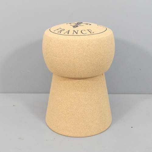 2037 - A contemporary champaign cork design stool. 34x51cm.