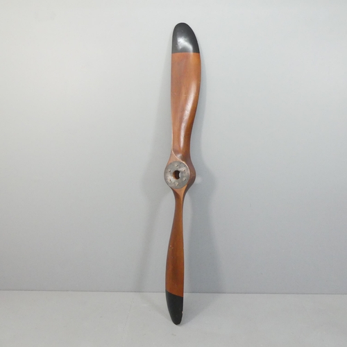 2040 - A large stained wood propeller, Length 197cm.