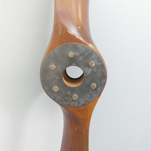 2040 - A large stained wood propeller, Length 197cm.