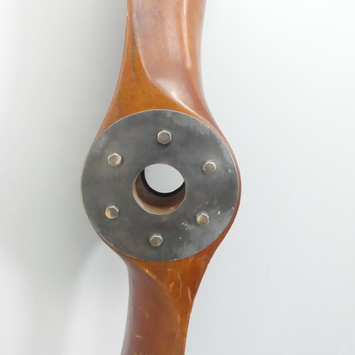 2041 - A large stained wood propeller, Length 197cm.