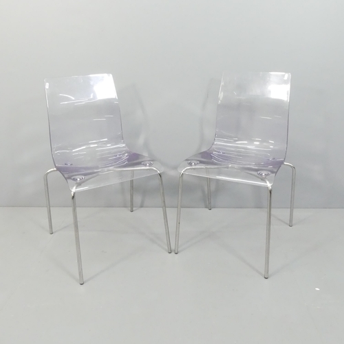 2042 - A pair of contemporary Italian perspex dining chairs on chrome frames.