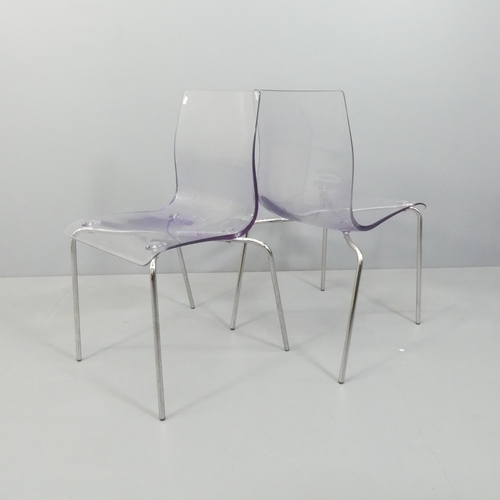 2042 - A pair of contemporary Italian perspex dining chairs on chrome frames.