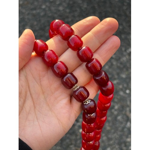 1232 - A single-strand cherry amber bead necklace, bead diameter 12.8mm, necklace 62cm, 80.9g