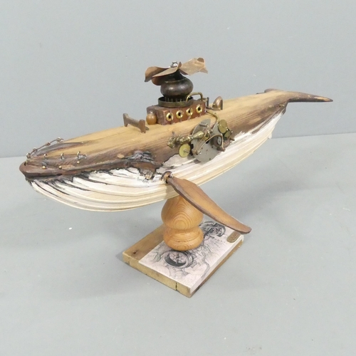 2056 - CLIVE FREDRIKSSON - A steampunk inspired sculpture of a whale. 60x35x30cm.