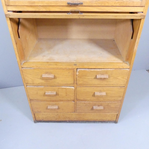 2063 - An early/mid 20th century oak haberdashery shop cabinet, made by Dudley & Co. Ltd., Showcase Manufac... 