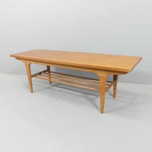 2066 - A mid-century teak two-tier coffee table. 122x40x39cm.