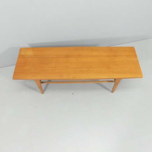 2066 - A mid-century teak two-tier coffee table. 122x40x39cm.