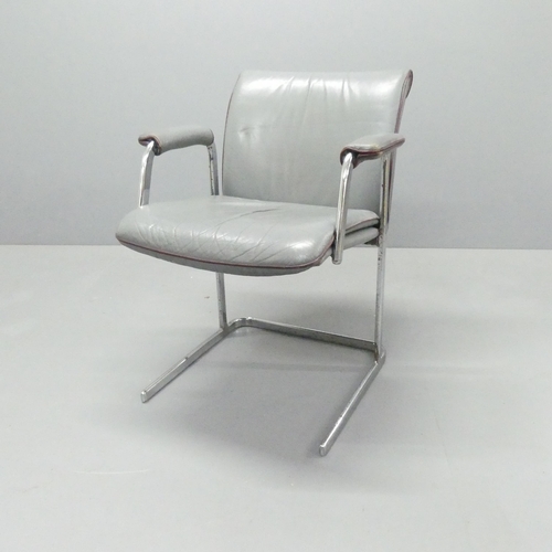 2067 - A mid-century office chair, with leather upholstery on a tubular chrome base.