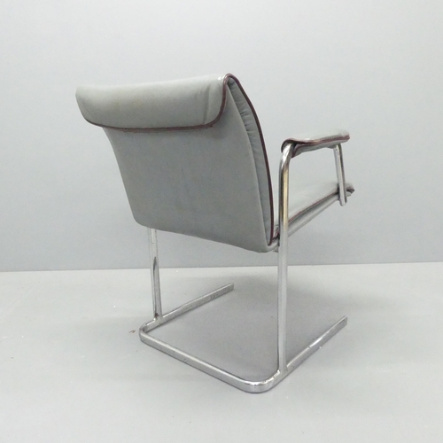 2067 - A mid-century office chair, with leather upholstery on a tubular chrome base.