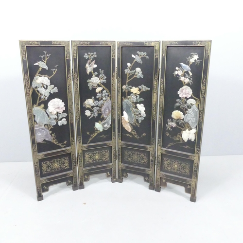 2068 - A Chinese black-lacquered four-fold screen, with gilt-painted and hardstone decoration. Each panel 2... 