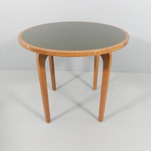 2069 - A mid-century design teak dining table with inset linoleum top. 85x75cm.