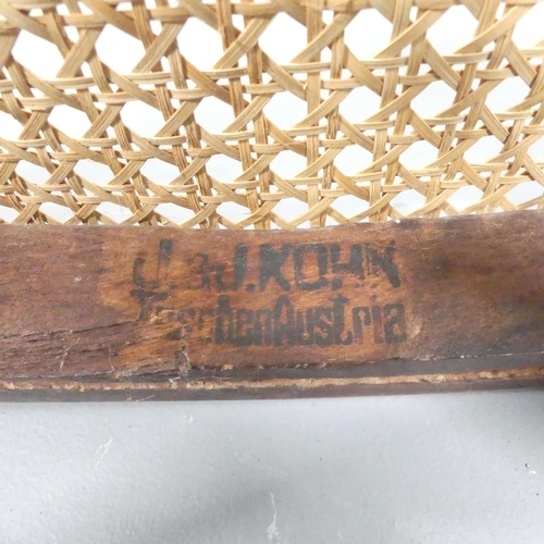 2070 - J & J Kohn - A model NR80 bentwood easy chair, with cane seat and maker's impressed mark beneath.