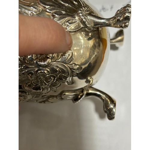 1780 - A Victorian silver bachelor's teapot, Nathan & Hayes, Birmingham 1892, relief embossed floral swag d... 