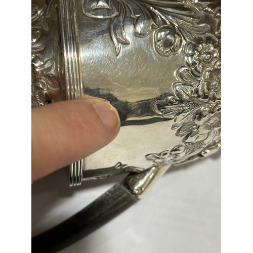 1780 - A Victorian silver bachelor's teapot, Nathan & Hayes, Birmingham 1892, relief embossed floral swag d... 