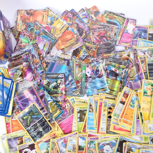 70 - POKEMON - a quantity of Pokemon trading card game loose cards, in associated collector's tins