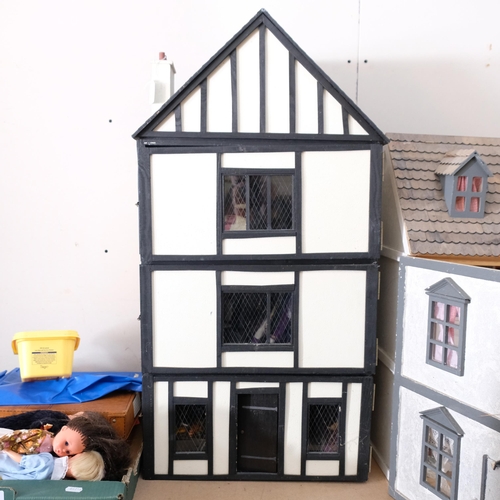 71 - An impressive hand-built Tudor style doll's house, over 3 floors, and including associated doll's ho... 