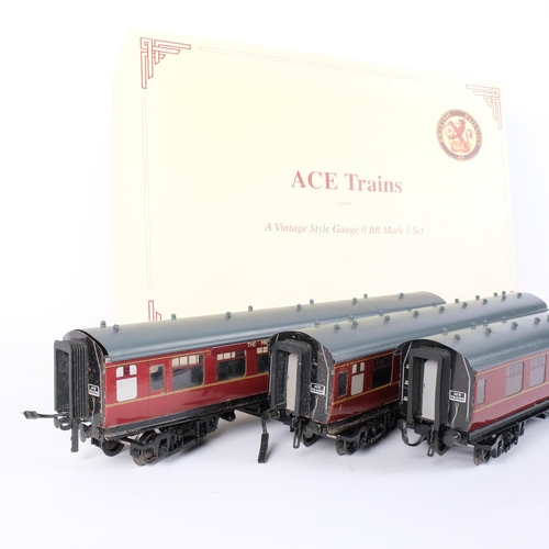 84 - ACE TRAINS - a set of 3 Vintage style gauge O British Rail Mark I coaches, in maroon, with 