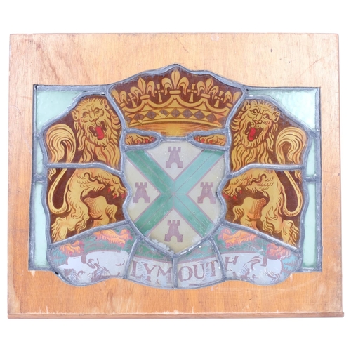 174 - A framed coloured leadlight armorial panel, overall width 49cm