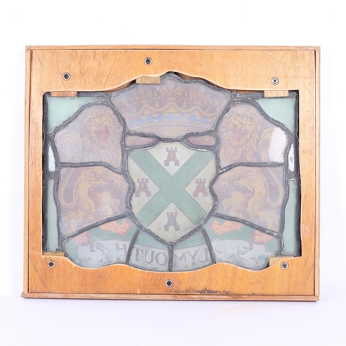 174 - A framed coloured leadlight armorial panel, overall width 49cm