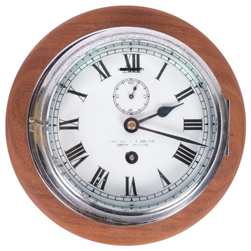 176 - A chrome-cased ship's bulkhead clock, 8-day movement, white enamel dial and Roman numerals with subs... 