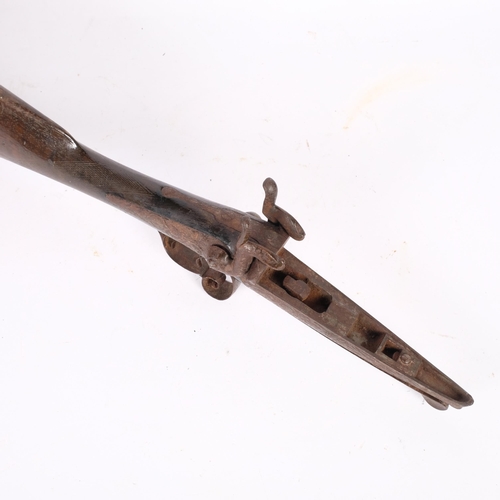 198 - A 19th century double-barrel percussion part rifle, comprising stock trigger and hammers, L56cm