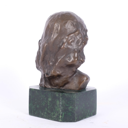 310 - A small bronze bust of a young girl, mounted on a green marble stand, H16cm