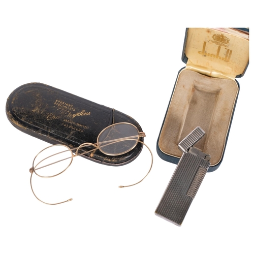 315 - A Vintage Ronson lighter in original box, and a pair of unmarked gold? framed Vintage glasses, in or... 