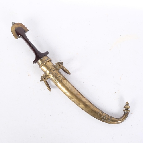 317 - A 19th century Moroccan Jambiya, turned wood handles, brass and white metal covered scabbard, overal... 