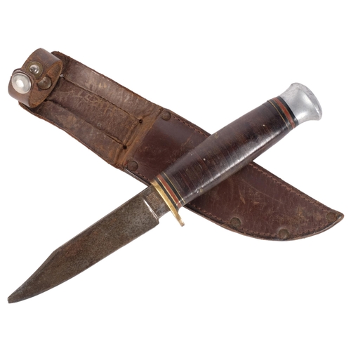 318 - A barrel handled hunting knife, by William Rogers, Sheffield England (tip missing), with leather she... 