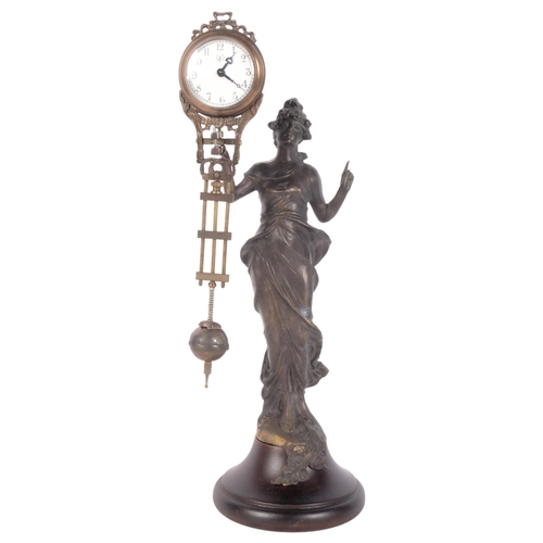 320 - An Art Nouveau style bronze figural mystery clock, H34cm