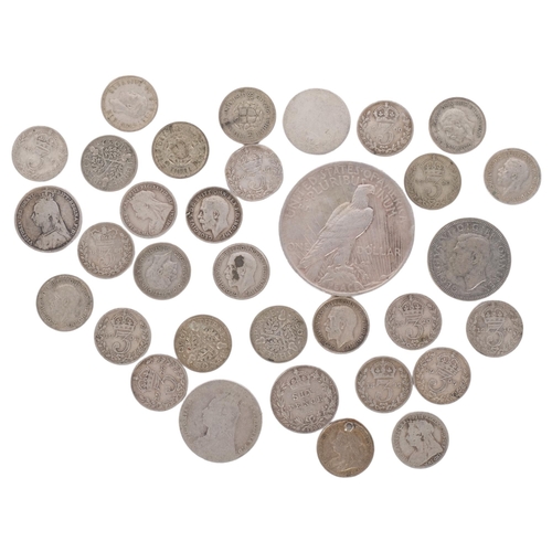 334 - A small quantity of pre-1946 English coins, mainly sixpences but to include a 1928 silver dollar