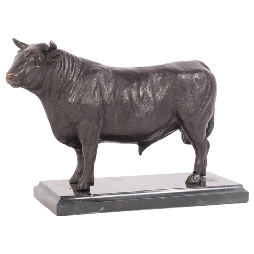 351 - A bronze sculpture of a bull, on a marbled base, H17cm