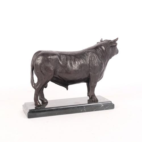 351 - A bronze sculpture of a bull, on a marbled base, H17cm