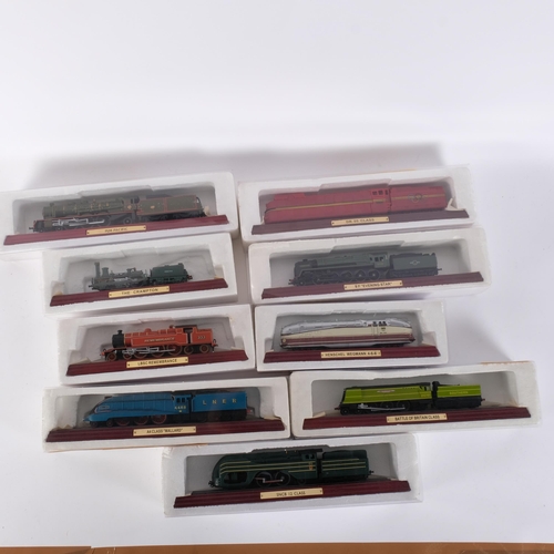 104 - A quantity of collectable model locomotives, various on associated wooden display plinths