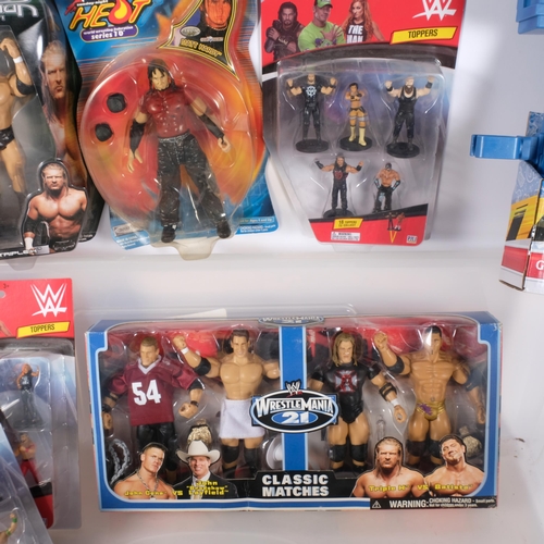 136 - A quantity of WWE related toys, including WWE Classic Superstars Collector's series, George 