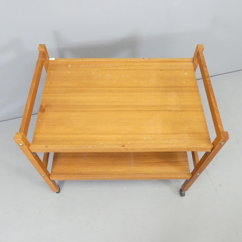 2708 - A mid-century style teak two-tier tea trolley. 71x64x47cm.