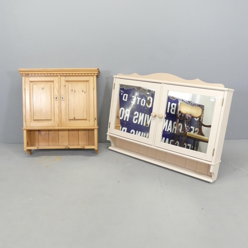 2681 - 2 pine hanging cupboards, both with twin doors revealing shelf fitted interiors. Largest - 98x70x26c... 