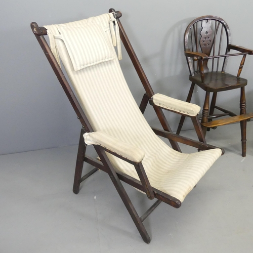 2688 - A teak framed campaign style folding chair, a child's high chair and a Victorian mahogany and uphols... 