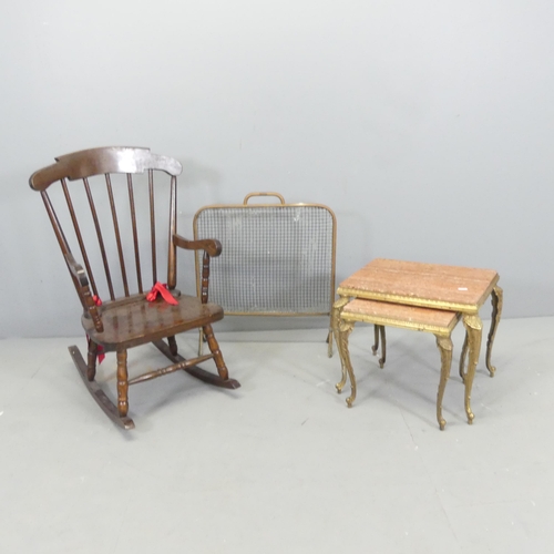 2692 - A brass fire screen, a child's rocking chair and two nesting onyx and brass occasional tables, large... 