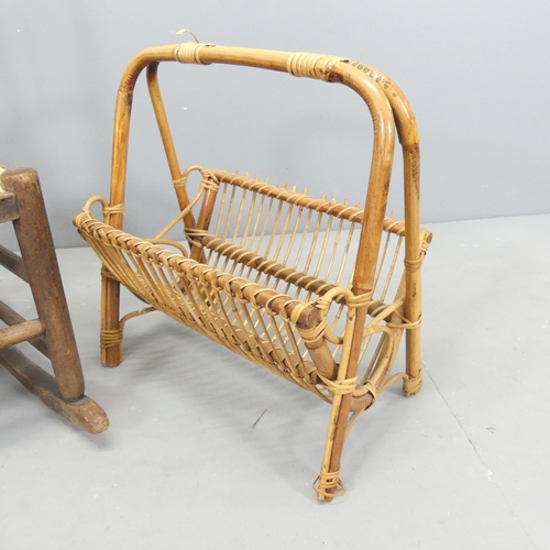 2693 - A bamboo magazine rack, and an antique spindle back rush-seated rocking chair. (2)