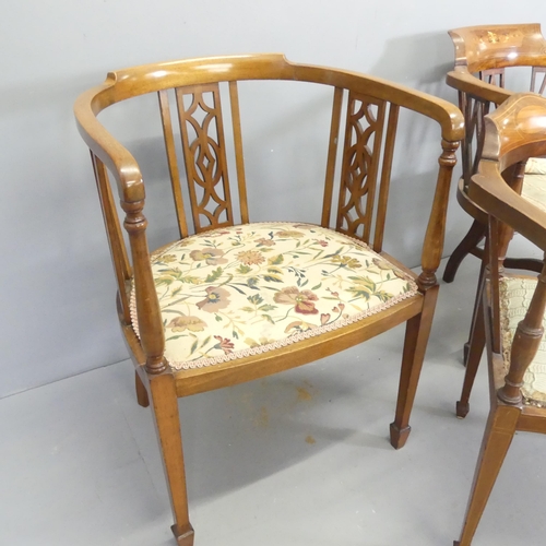 2698 - A pair of Edwardian mahogany and upholstered tub chairs, with pierced decoration and spade feet, and... 