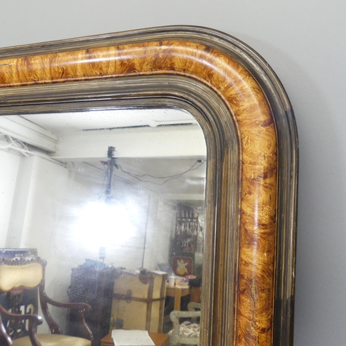 2701 - A Victorian walnut and ebonised  overmantle mirror. 96x145cm