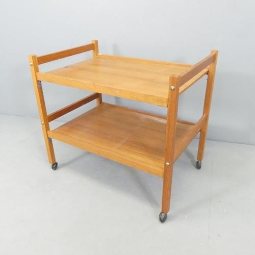 2708 - A mid-century style teak two-tier tea trolley. 71x64x47cm.