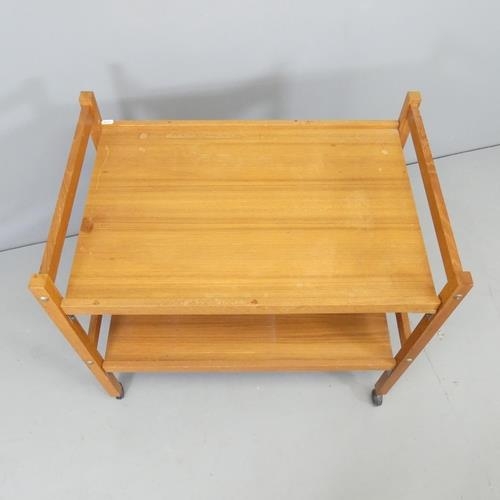 2708 - A mid-century style teak two-tier tea trolley. 71x64x47cm.