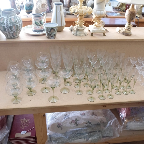 358 - ROSENTHAL STUDIO-LINE - a large suite of Papyrus green tulip stemmed glassware, to include various C... 