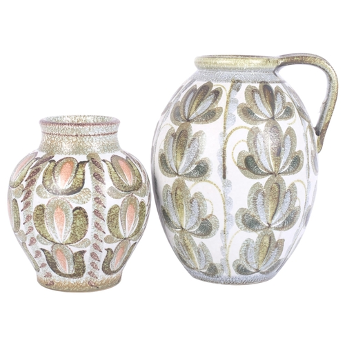 370 - A large Denby Studio pottery ceramic jug, H31cm, and a similarly decorated vase, both stamped to the... 