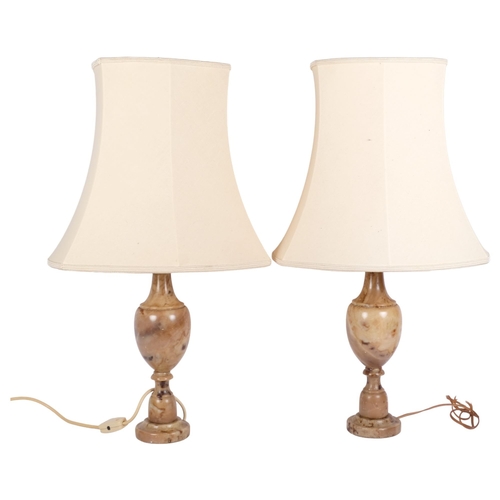 373 - A pair of composite marble-effect table lamps, with associated lamp shades, H60cm