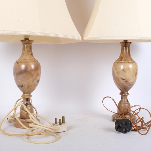 373 - A pair of composite marble-effect table lamps, with associated lamp shades, H60cm