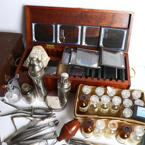 950 - A collection of various magic lantern slides, apothecary bottles, medical box and contents etc